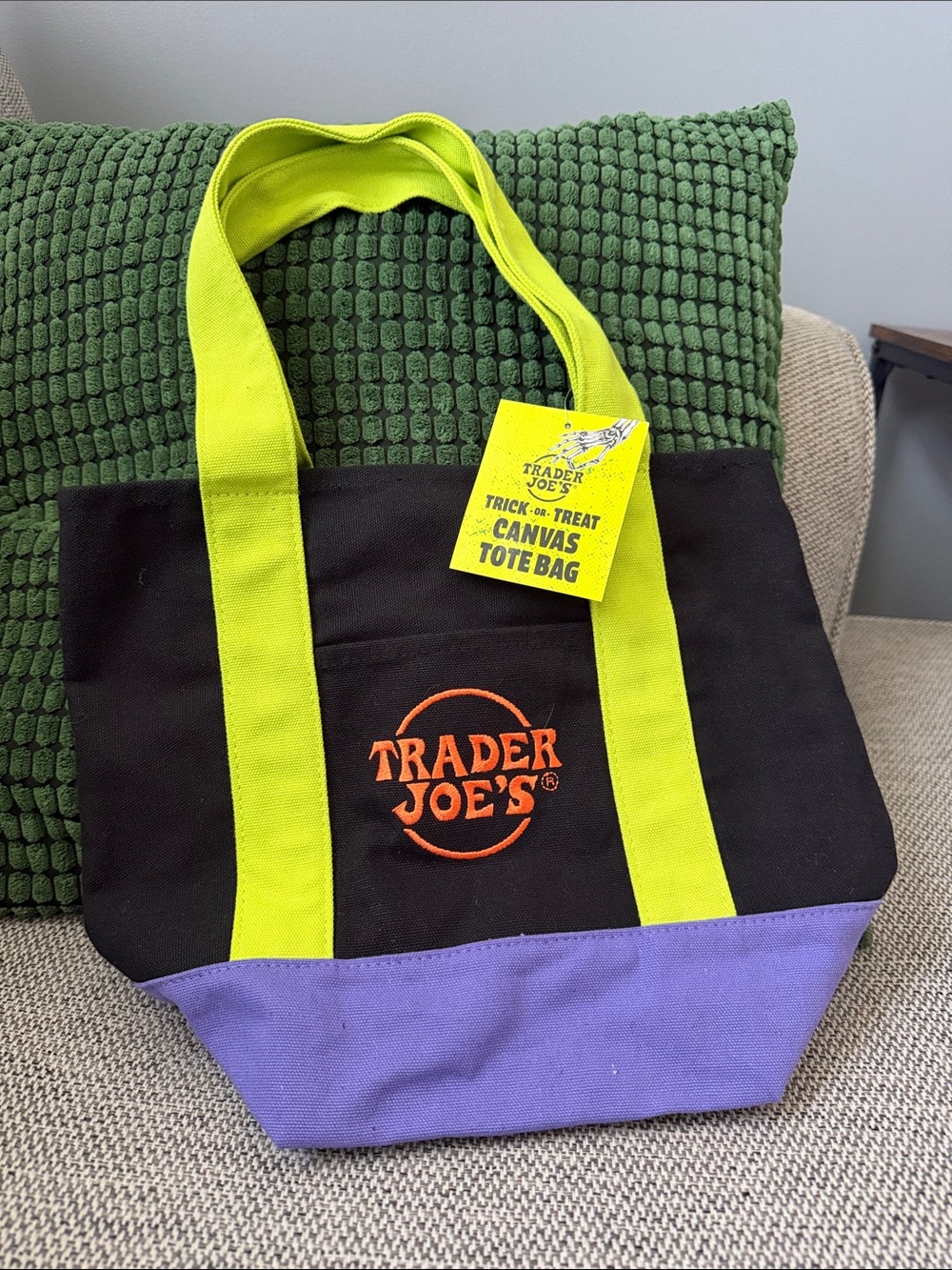 Trader Joe’s Trick or Treat Canvas Tote Bag in Purple, Black, Green, & Orange